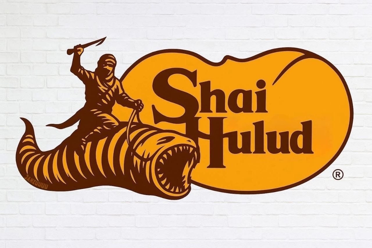 Auto-generated description: A stylized logo features a figure riding a sandworm with the text Shai Hulud in bold letters.